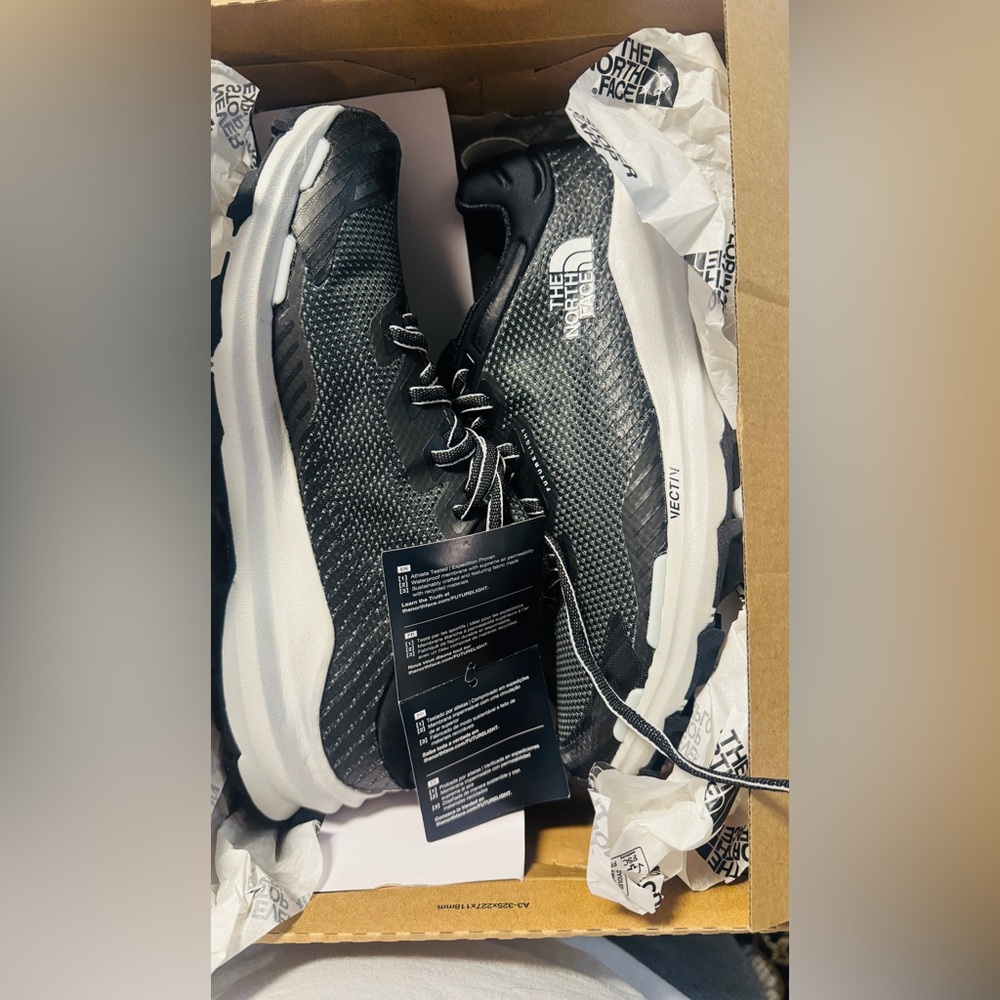 The North Face Woman’s Black and Sneakers. Brand new with Tag. Size 11